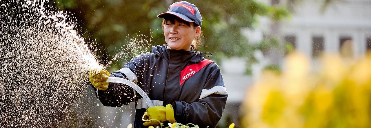 Woman watering plants