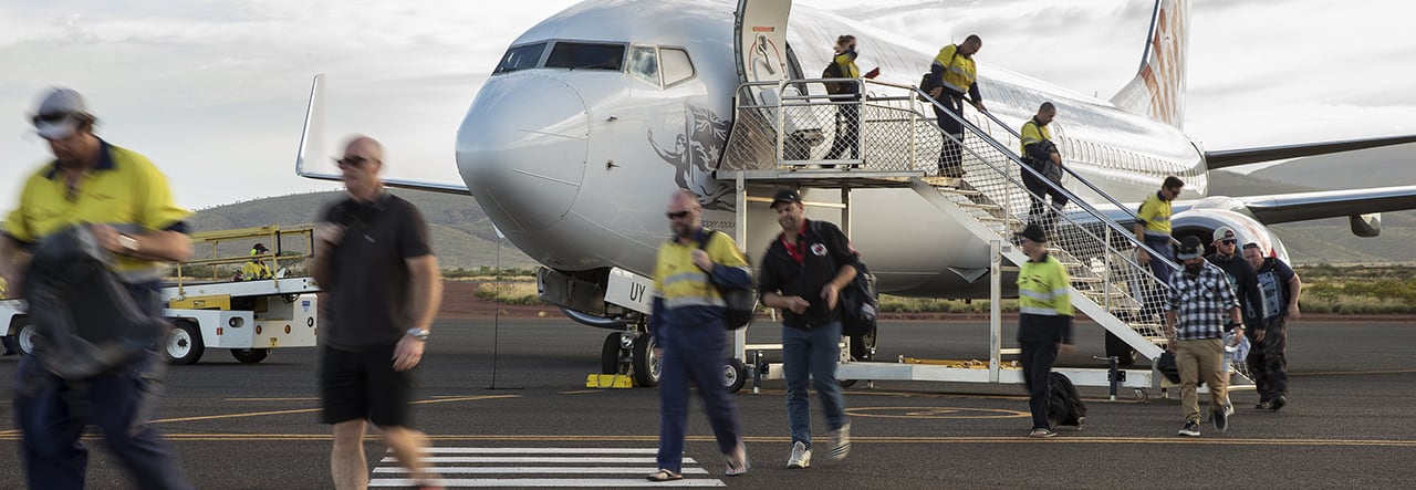 people leaving the plane