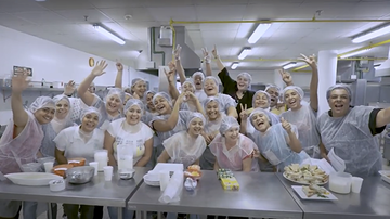 group of people dressed in PPE