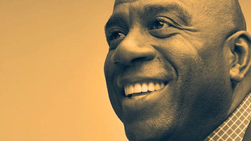 Magic Johnson on a orange background