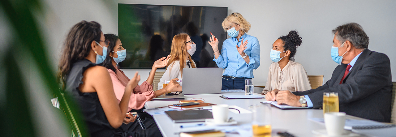 colleagues around a meeting table